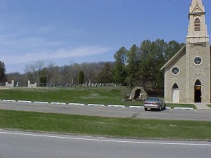 brick church exterior and cemetery
